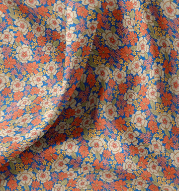Baumwolle bedruckt Blumen orange auf blau *Ab 50cm