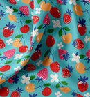 Baumwolle bedruckt Obst auf türkis *Ab 50cm-1