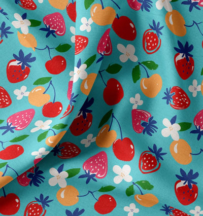 Baumwolle bedruckt Obst auf türkis *Ab 50cm