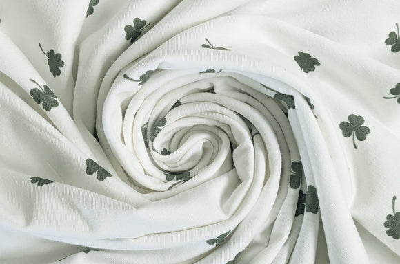 Baumwolljersey Kleeblätter creme *Ab 50cm