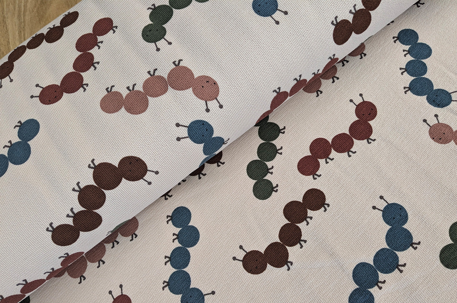 French-Terry Krepp creme Raupen *Ab 50cm